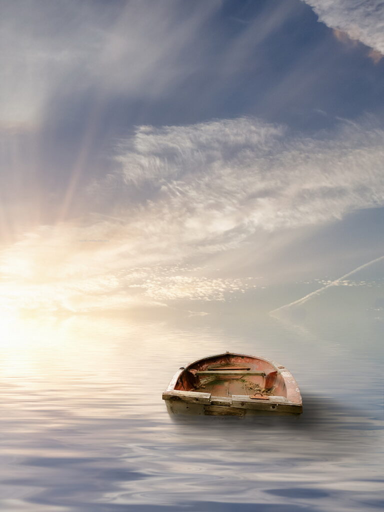 lone row boat in ocean with big sky