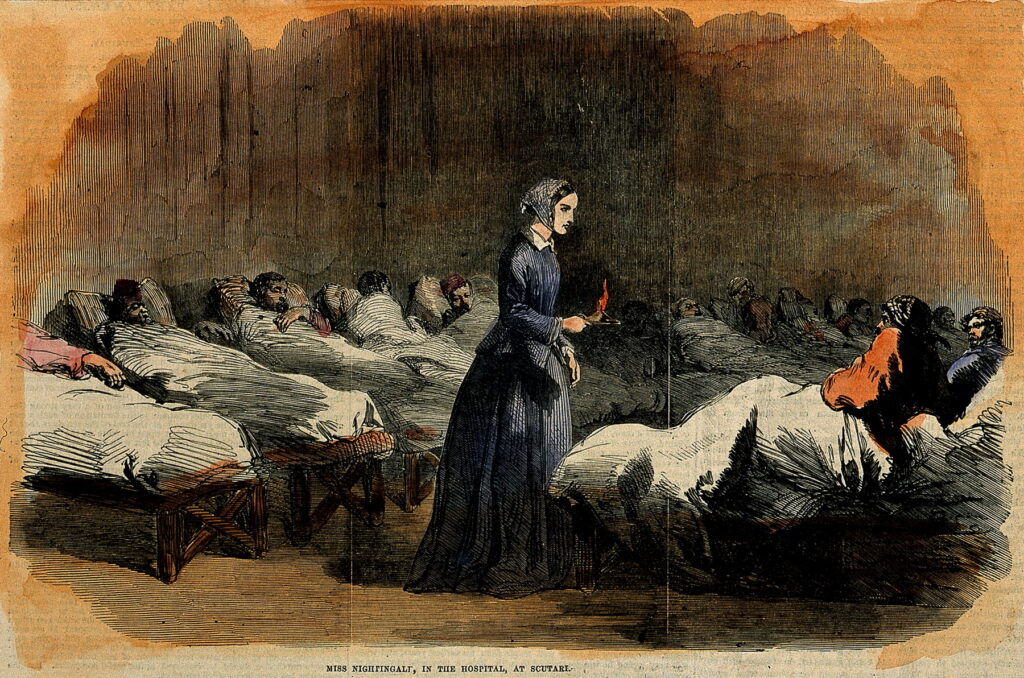 Colored wood engraving of female nurse holding a candle in a roon full of sick men in beds.